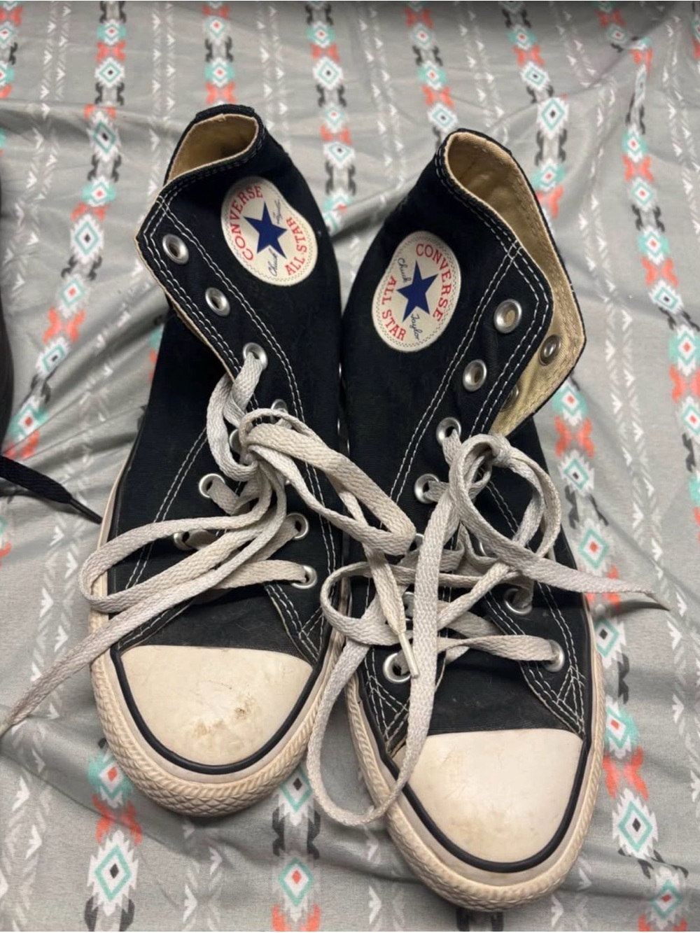 Converse Black and White High-Top Chuck Taylors
